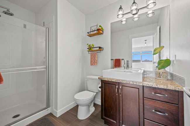 228 Rainbow Falls Green, Home with 3 bedrooms, 3 bathrooms and 4 parking in Chestermere AB | Image 37