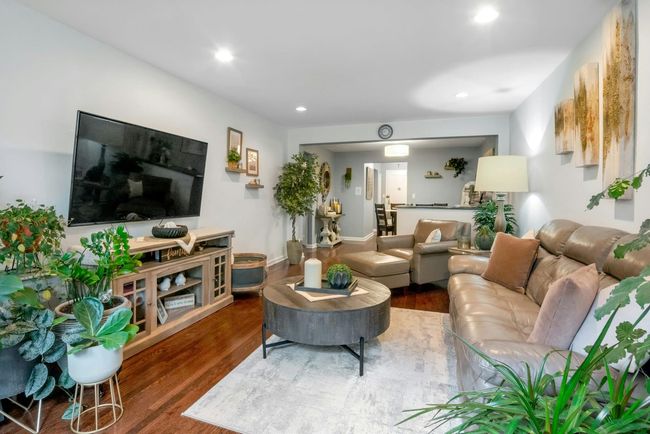 Living area featuring wood finished floors and recessed lighting | Image 5