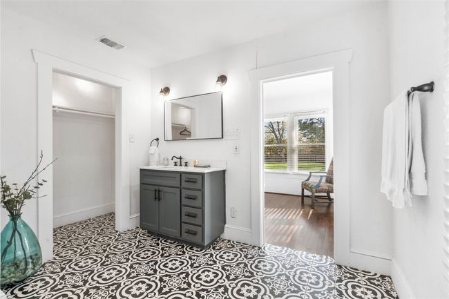 Bathroom with vanity and baseboards | Image 17
