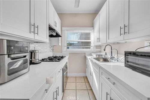 218-4125 S Figueroa St, LOS ANGELES, CA, 90012-2556 | Card Image