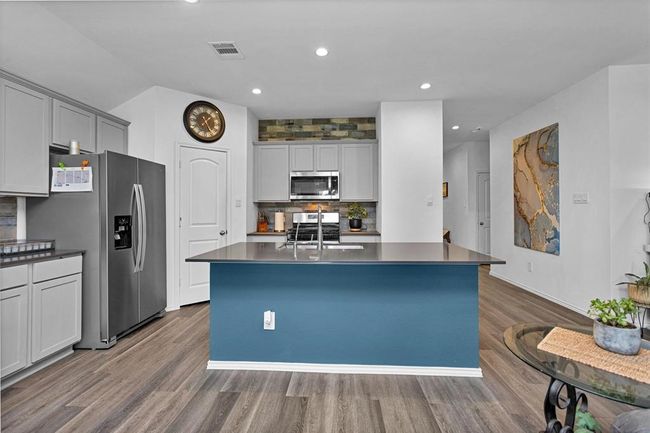 The large island is perfect for entertaining! | Image 11