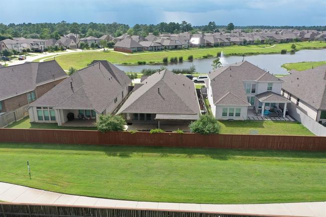 Greenbelt Behind Home and Walking Path. | Image 35