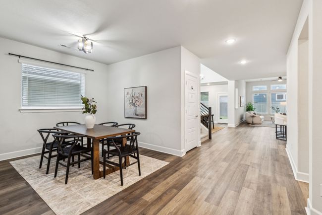 Dining area with stairway, baseboards, wood finished floors, and recessed lighting | Image 16