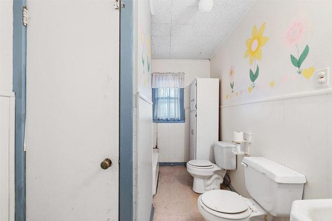 Bathroom with toilet and wainscoting | Image 20