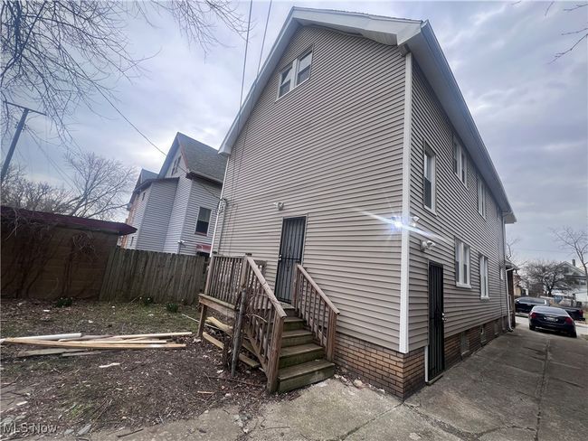 Rear view of house featuring fence | Image 5