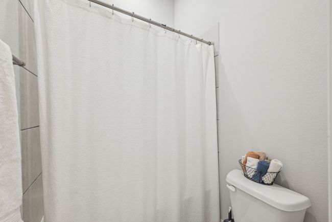 Full bath featuring deep soaking tub, double vanity | Image 31