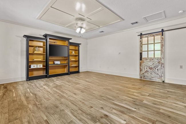 Large windows let in lots of natural light, keeping the space bright during the day. | Image 7