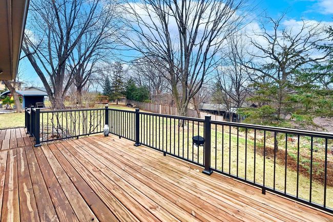 Large Deck Overlooking Backyard. When viewing the property on site look for the markers showing approximate lot lines! | Image 7