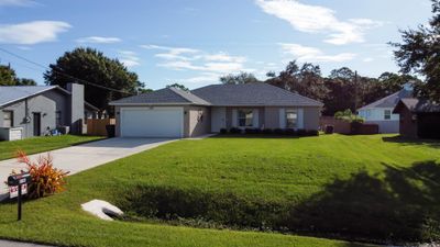 6106 Bamboo Drive, House other with 3 bedrooms, 2 bathrooms and null parking in Fort Pierce FL | Image 3