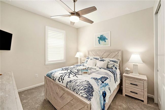 Bedroom #2 with large closet and plenty of space for guests to visit. | Image 15