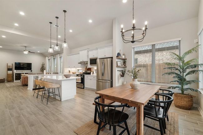 Dining area connects into kitchen area. | Image 8