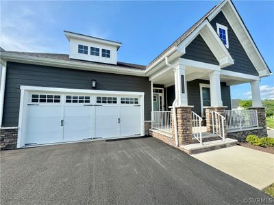 Craftsman inspired home with covered porch and a garage | Image 2