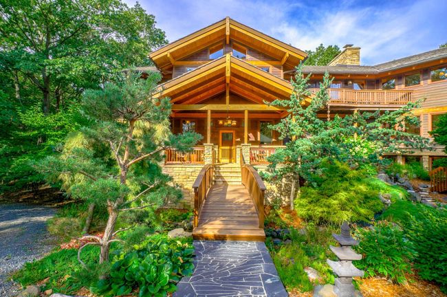Extensive use of cedar and stone on the exterior | Image 5