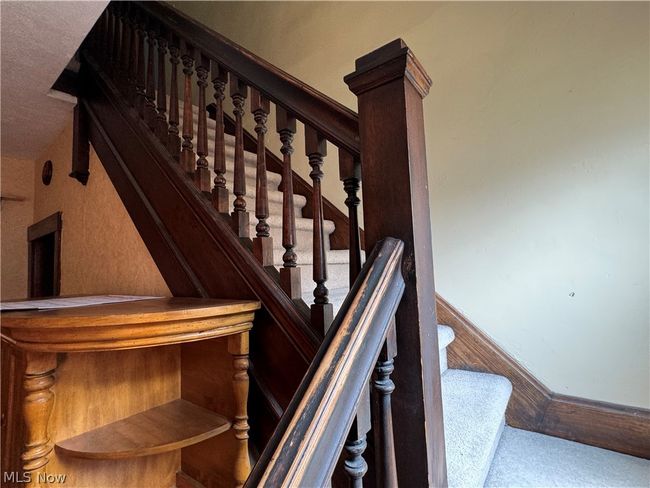 Stairs featuring carpet floors | Image 18