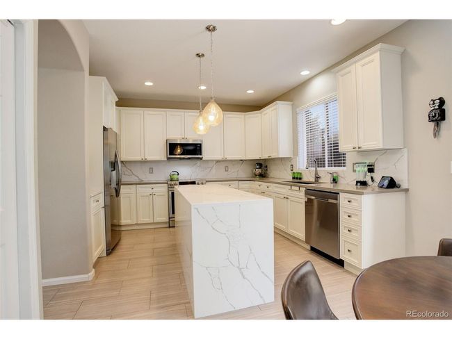 5830 Jasper Pointe Cir, House other with 4 bedrooms, 4 bathrooms and null parking in Castle Pines CO | Image 11
