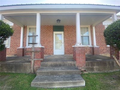 Property entrance featuring a porch | Image 2