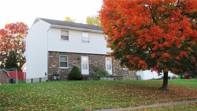 View of front of property with a front lawn | Image 1