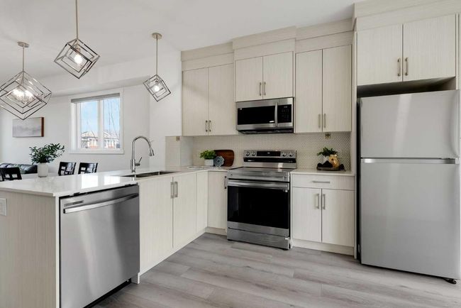 11 Cornerstone Row Ne, Townhouse with 3 bedrooms, 3 bathrooms and 2 parking in Calgary AB | Image 7