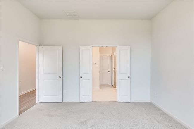 Unfurnished bedroom featuring carpet and baseboards | Image 17