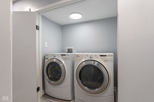 washroom featuring washer and clothes dryer | Image 33