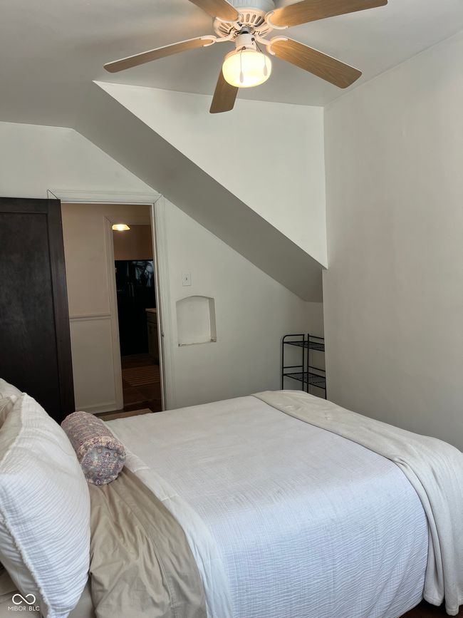 bedroom featuring vaulted ceiling and ceiling fan | Image 8