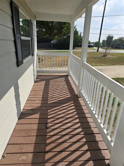 Wooden terrace with covered porch | Image 2