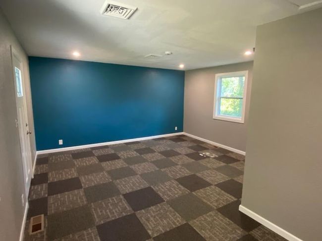 View of tiled spare room | Image 22