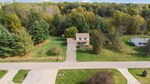 13399 Jennifer Dr, Perry, MI, 48872-9121 | Card Image