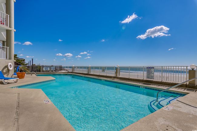 Community pool featuring a patio area | Image 28