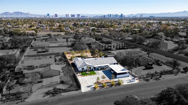 Drone / aerial view featuring a view of city and a mountain view | Image 38