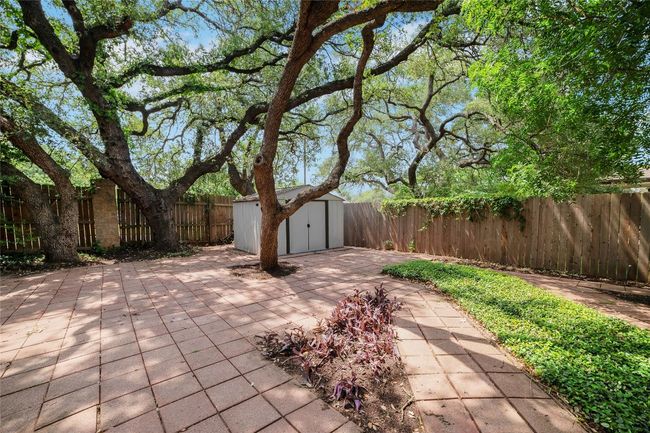 Fenced backyard featuring a patio | Image 33