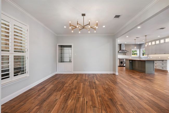 Gorgeous vinyl floors throughout the downstairs. | Image 9
