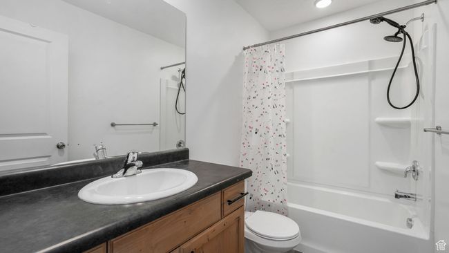 Bathroom with shower / bath combo and vanity | Image 17