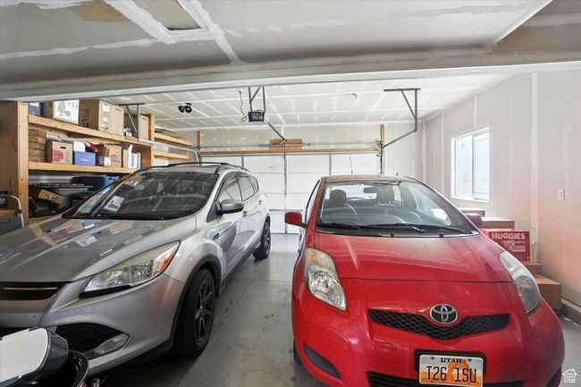 Garage with a garage door opener | Image 27