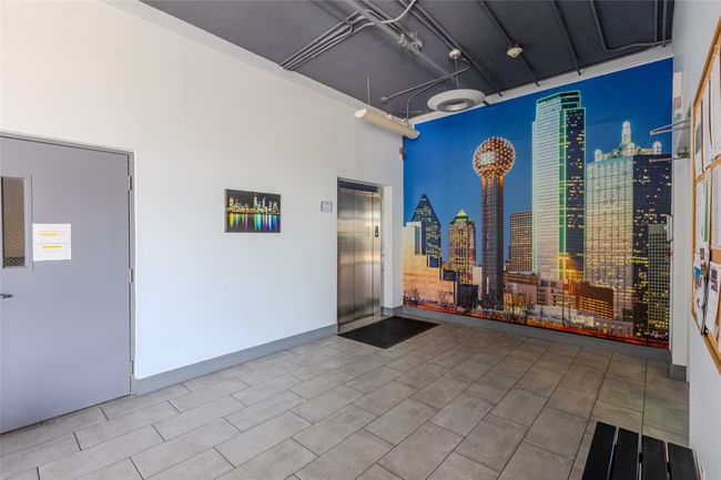 View of patio featuring elevator and a skyline view | Image 5