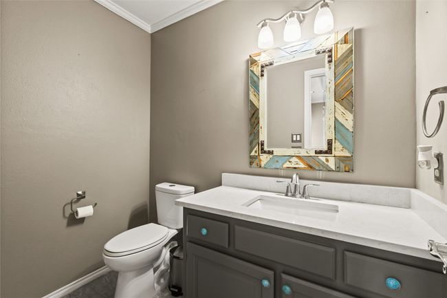 Half bath with crown molding and vanity | Image 27