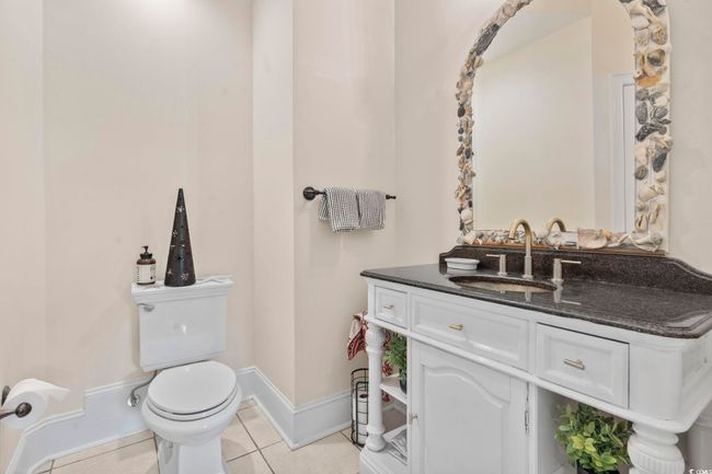 Bathroom featuring tile patterned floors, toilet, baseboards, and vanity | Image 21