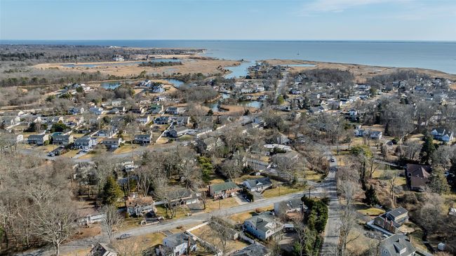 Birds eye view of property featuring a water view and a residential view | Image 32