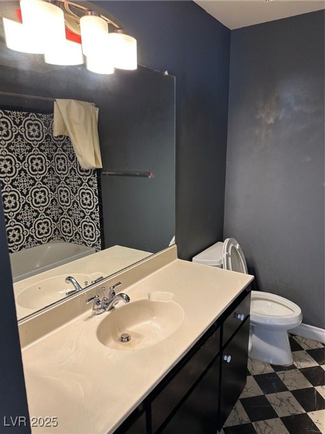 Full bath featuring toilet and vanity | Image 6