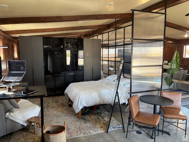 Bedroom featuring beam ceiling | Image 59