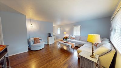 Living room featuring dark hardwood / wood-style flooring | Image 2