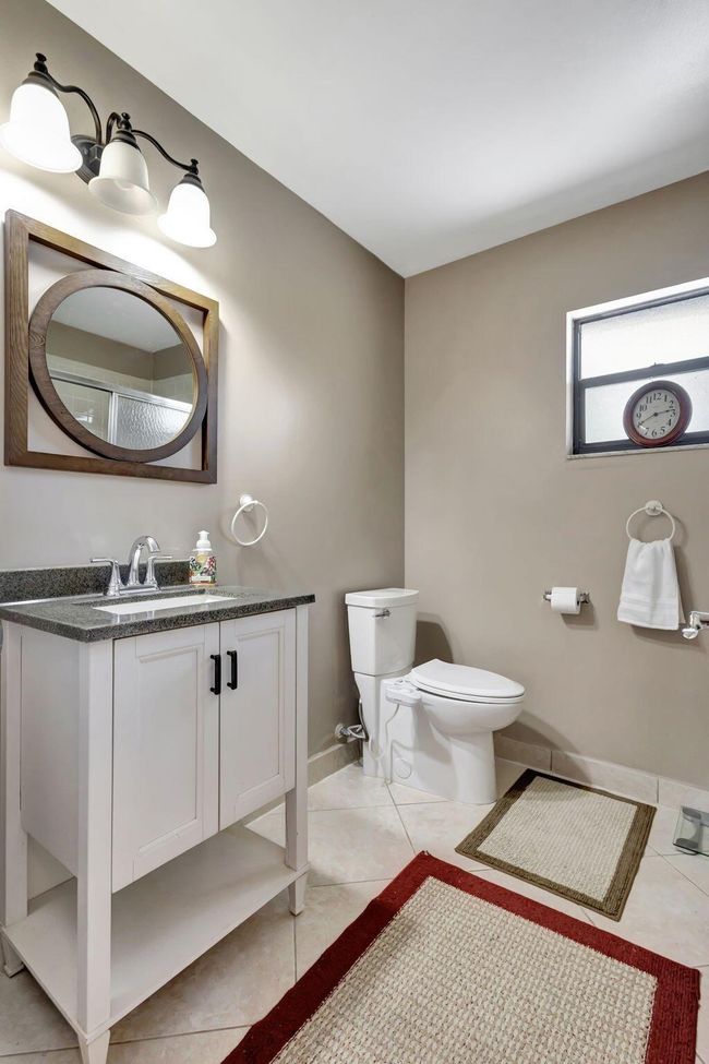 5855 Se Mitzi Ln, House other with 2 bedrooms, 2 bathrooms and null parking in Stuart FL | Image 19