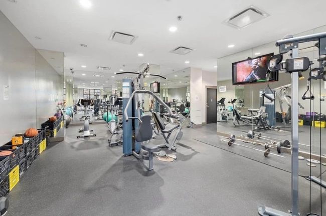 Workout area featuring visible vents and recessed lighting | Image 16