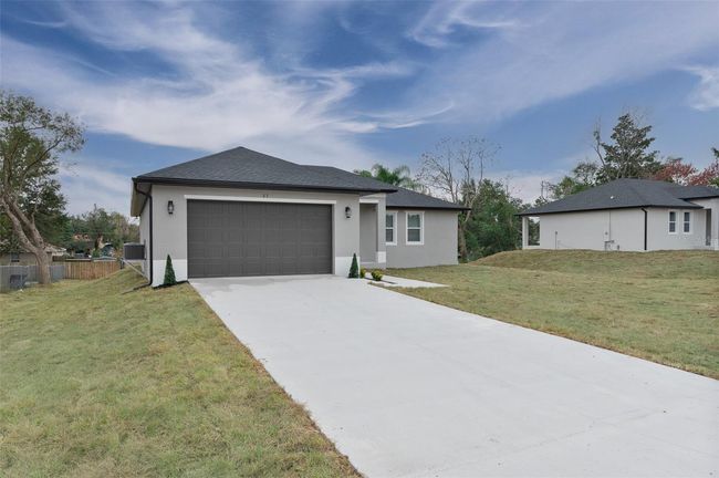 27 Palmetto Dr, House other with 3 bedrooms, 2 bathrooms and null parking in DEBARY FL | Image 6