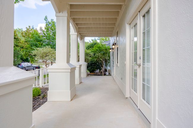 Covered porch featuring french doors | Image 5
