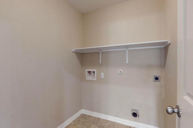 Laundry room featuring , washer hookup, laundry area, gas dryer hookup, and electric dryer hookup. Private room with door not a walk through one. | Image 31