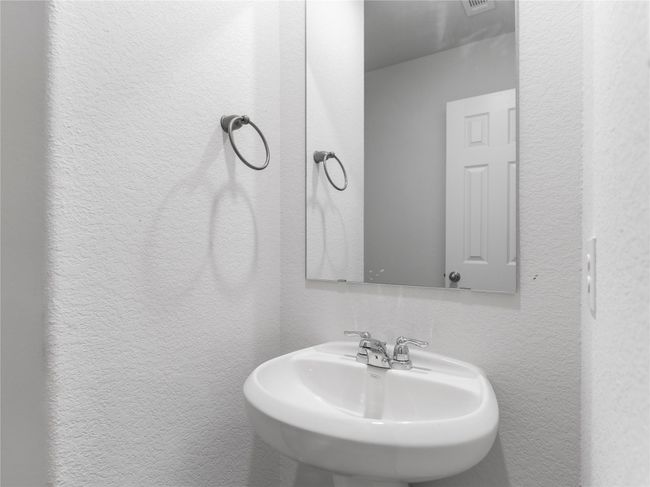 Convenient downstairs half bath for guests. | Image 9