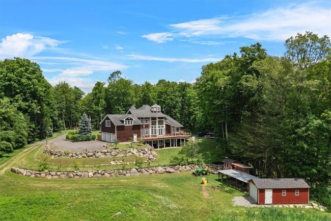 Ariel view of yet another dimension of this absolutely beautiful custom built, attention to detail home!! | Image 40