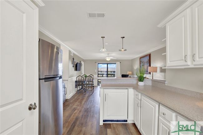 Updated Kitchen with Stainless Steel Appliances & Breakfast Bar | Image 15