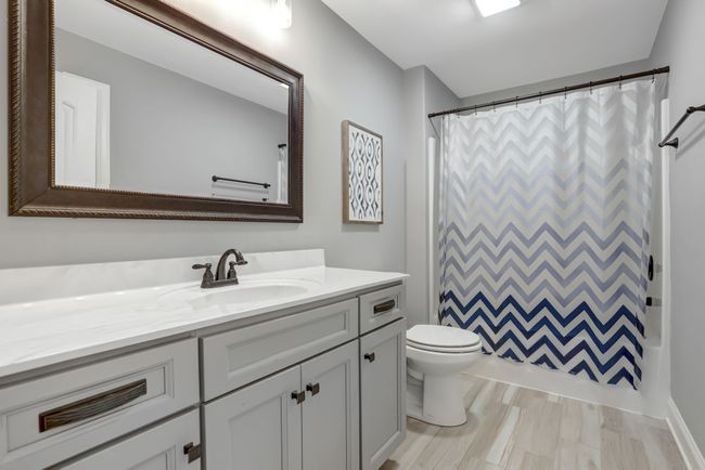 Full bathroom upstairs with tub/shower combo | Image 19